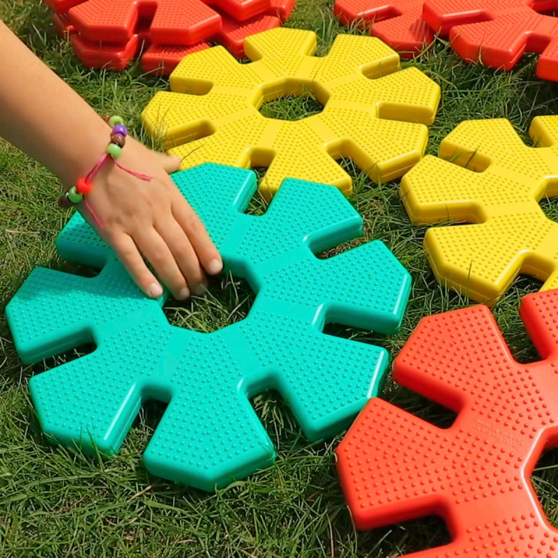 Zoomed-in view of chunky, colorful Giant Octoplay pieces made from 100% recycled plastic—perfect for creative outdoor play! Zoomed-in view of chunky, colorful Giant Octoplay pieces made from 100% recycled plastic—perfect for creative outdoor play!