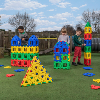 Children build colourful 3D structures with Giant Polydron made from 100% recycled plastic
