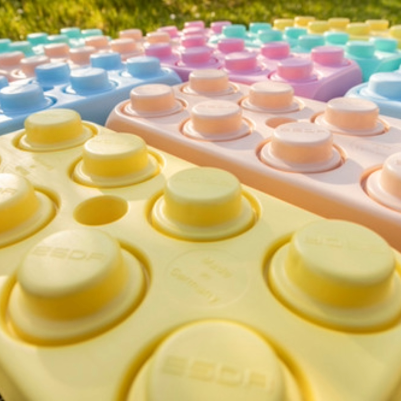 These strong building blocks are made with 50% recycled plastic These strong building blocks are made with 50% recycled plastic