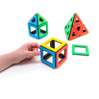 Children create colorful designs with the Magnetic Polydron basic set. Children create colorful designs with the Magnetic Polydron basic set.